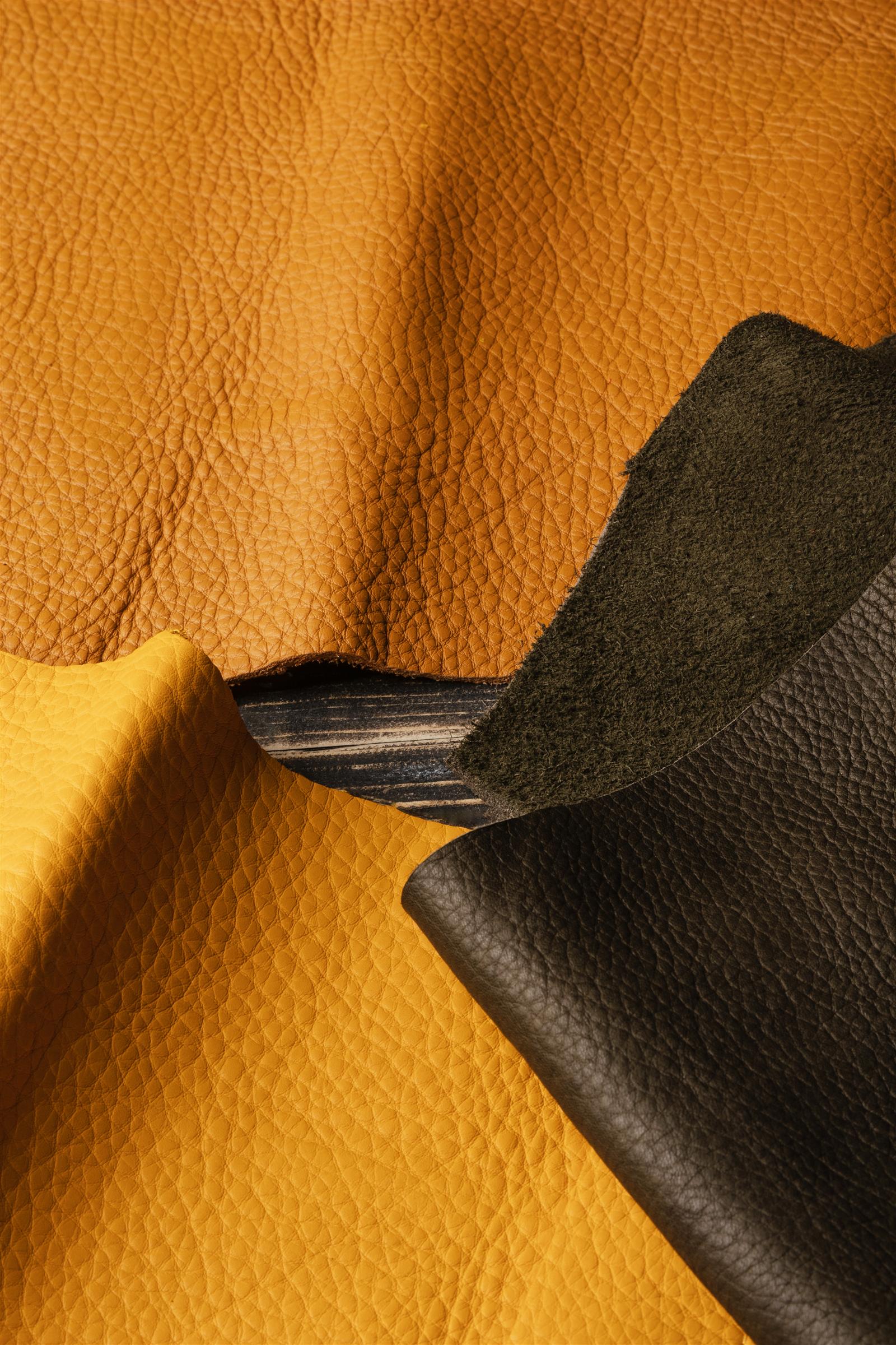Mustard and olive full-grain hides overlapping